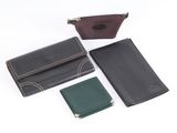 three different types of leather wallets and a wallet case