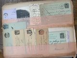 an old book with a bunch of stamps on it