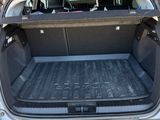 the back of a car with its trunk open and the back of the car with its trunk open