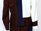 a mannequin dress with a brown and blue color block pattern
