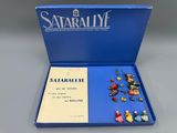 a blue box with a bunch of small figurines in it