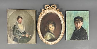 three framed portraits of a woman and a boy are on a wall