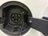 a close up of a car ' s plugged in to a vehicle