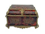 an image of a decorative box with a red and black design