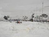 a painting of a bunch of shoes in the snow