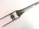 a pair of tonges that are sitting on a table