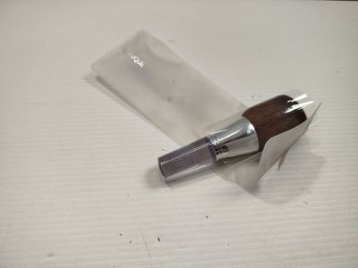 a pen that is laying on top of a piece of paper