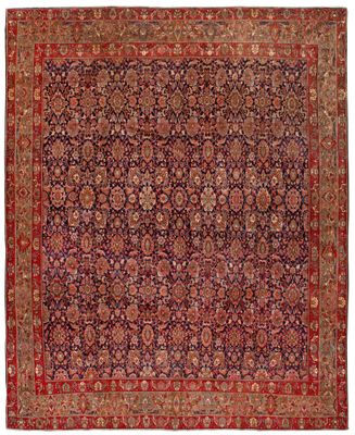 un tapis persan ancien aux couleurs rouges et bleues