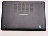 a black laptop with a small hole in the back