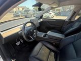 the interior of a car with black leather seats and a steering wheel