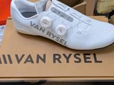 a box with a pair of white shoes on it
