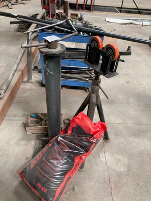 an image of a man working on a machine in a factory