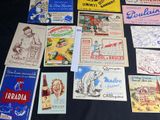 many different types of advertising cards on a table