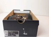 a box with a pair of shoes inside of it