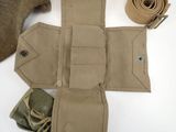 a roll of tan fabric and a roll of tan cloth