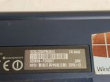 a close up of the back of a laptop with a sticker on it