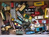 a box full of toy cars and trucks in it