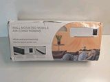 the box is open and ready to be used as a wall mounted mobile air conditioner