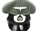 a black hat with a white and red emblem on it