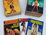 four books of vampire comics are on a white surface