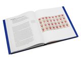 an open book with stamps on the pages and a blue cover