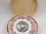 a small box with a picture of a man on it