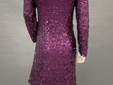 a mannequin dress with purple sequins on a mannequin mannequin mannequin mannequin mannequin mannequin manne