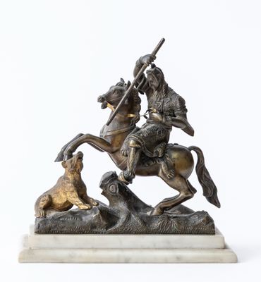 statue of a man on a horse with a dog on a white background