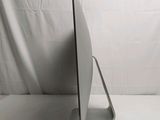 a laptop computer sitting on a stand on a white surface