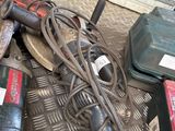 a pile of tools that are sitting on the floor