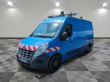 the blue van is parked on a checkered floor in a room