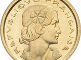 une image montrant un gros plan d'une pièce de monnaie à l'effigie d'une femme