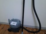 an image of a vacuum and a dryer on the floor