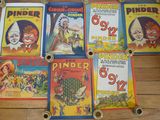 plusieurs livres pour enfants sont alignés sur une table en bois