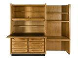 an image of a wooden cabinet with drawers and shelves