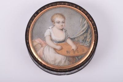 tableau représentant une jeune fille tenant un instrument de musique, dans un cadre noir et doré