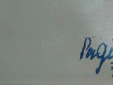 une photo d'un tableau sur lequel figure une inscription en bleu