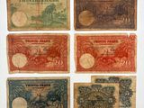 six different bank notes with different designs on them