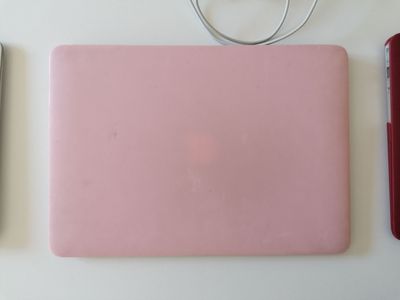 three different types of electronic devices on a white table