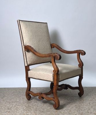 an old wooden chair with beige upholstered upholstered upholstered upholstered upholstered