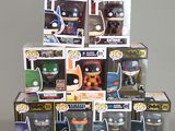 batman pop vinyl figures are stacked on top of each other