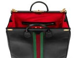 a black briefcase with a green, red and green stripe