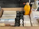 a box with a lot of items in it on a table