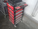 a picture of a stack of tools in a garage