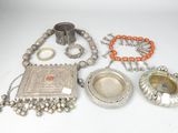 an assortment of silver and coral jewellery including a silver plate, a silver tray, a silver ring and a silver necklace