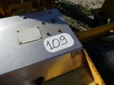 a close up of a metal box with a number on it