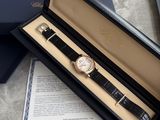 a watch that is in a box on a table