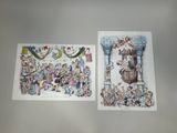 two christmas cards on a table with a drawing of santa