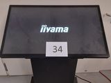 the display is black and has a green sign on it