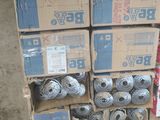 de nombreuses boîtes remplies d'oursons posées sur une palette